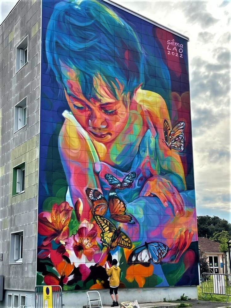 Street art mural 'Permaculture' by Sema LAO in Cognac, depicting eco-friendly themes and vibrant urban art in the Charente region